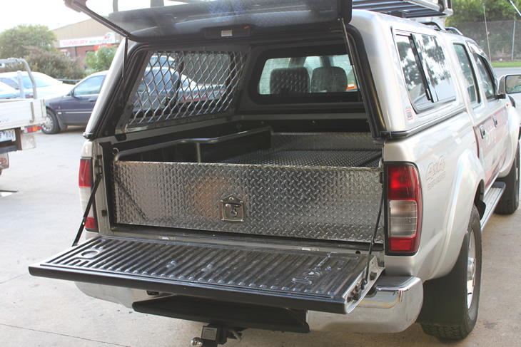 slide out tool box in back of ute in stowed position